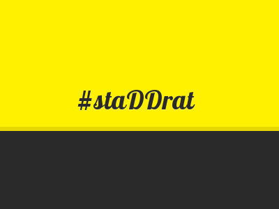 Schriftzug 'staDDrat' auf gelb-schwarzem Hintergrund